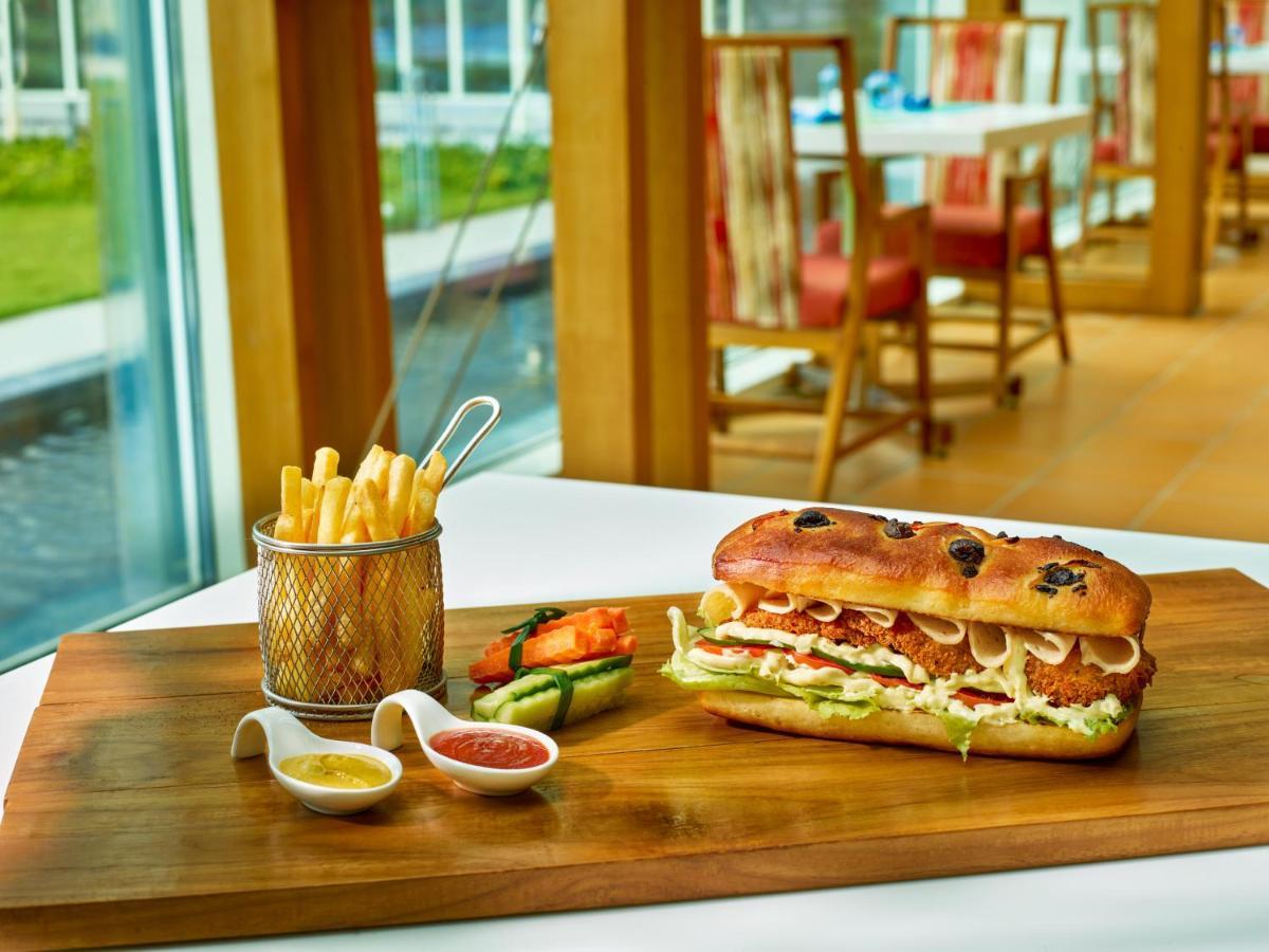 O By Tamara, Trivandrum Thiruvananthapuram Exterior foto A chicken sub