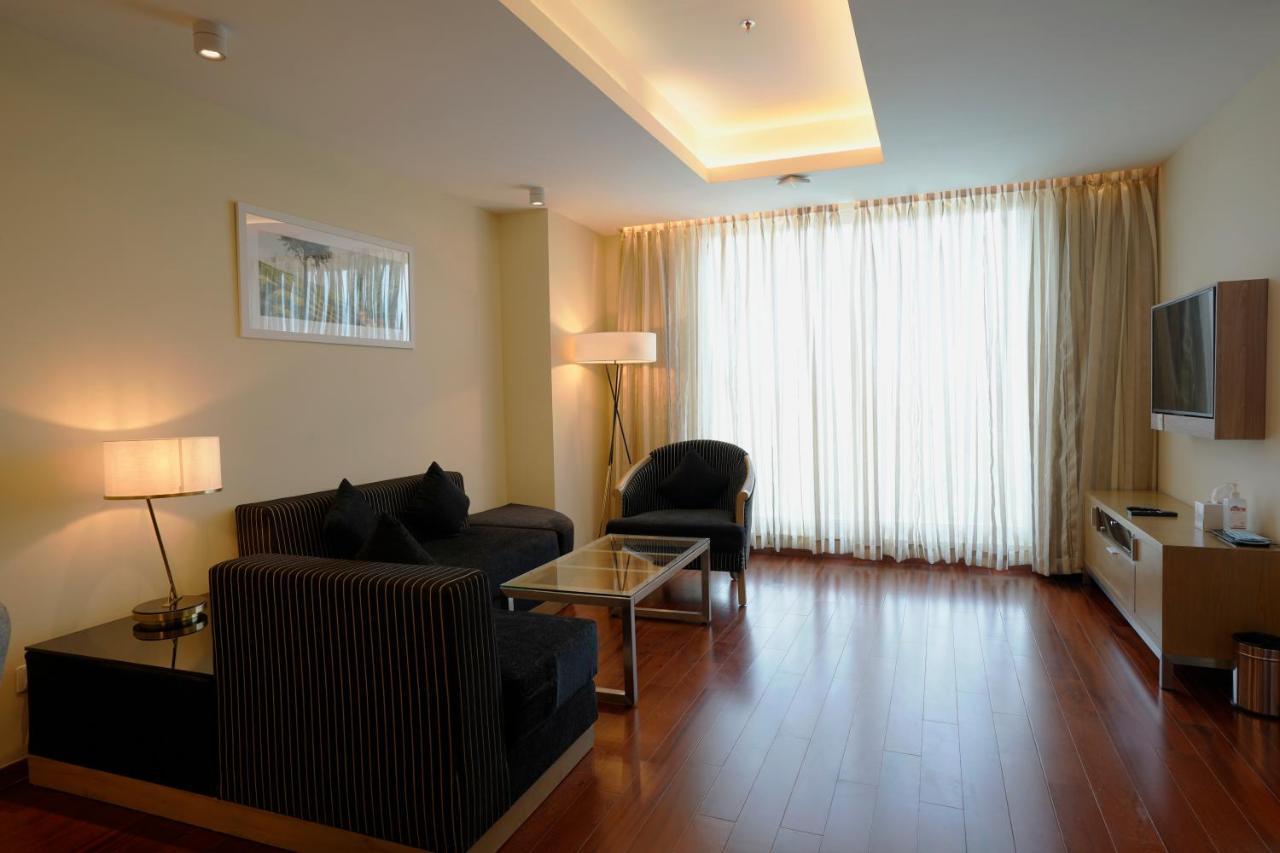 O By Tamara, Trivandrum Thiruvananthapuram Exterior foto Living room